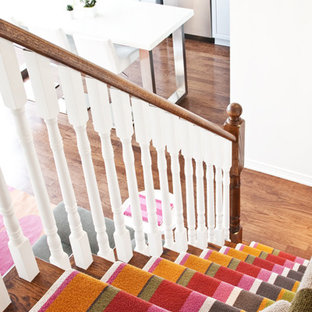 Staircase - mid-sized eclectic wooden l-shaped staircase idea in Toronto with wooden risers