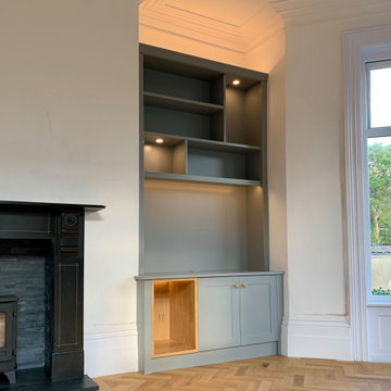 Classic/Modern Mix bookcase with lighting and shaker cabinet doors and oak log s