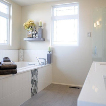 Contemporary show home with orange accessories.