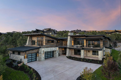 Example of a transitional exterior home design in Salt Lake City