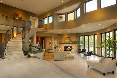 Inspiration for a huge contemporary formal and open concept living room remodel in Los Angeles with brown walls, a corner fireplace and no tv