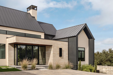 Example of a danish exterior home design in Austin