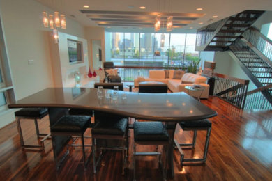 Large trendy medium tone wood floor great room photo in Houston with white walls