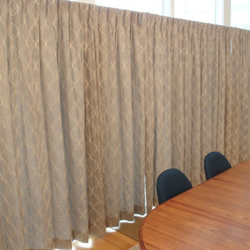 Draperies for a dining room and living room in a contemporary home