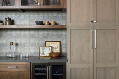 Dry bar - transitional dry bar idea in San Diego with gray backsplash and gray countertops