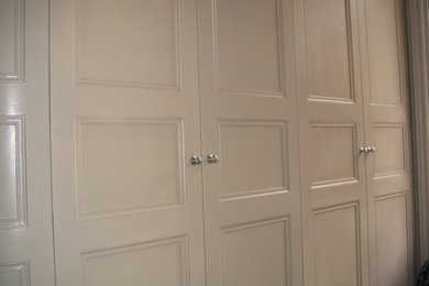This is an example of a large modern storage and wardrobe in Edinburgh.