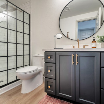 Transitional Guest Bathroom with Black Frame Shower Door