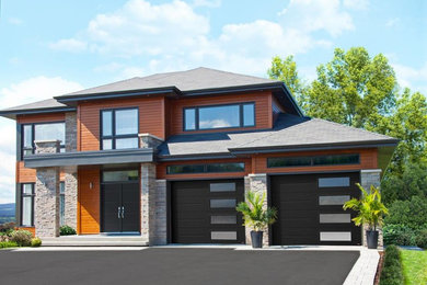 Mid-sized trendy attached two-car garage photo in Cedar Rapids