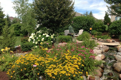 Inspiration for a large rustic landscaping in Other.