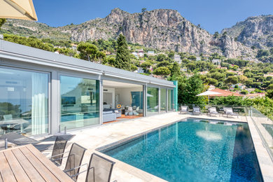 Inspiration pour une piscine design.