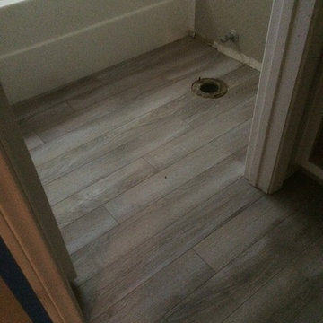 Delaware Bay Driftwood 10 mm laminate with attached underlayment
