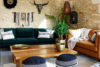 Example of a large southwest formal and open concept limestone floor living room design with white walls, no fireplace and no tv