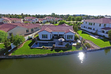 Example of a southwest home design design in Phoenix