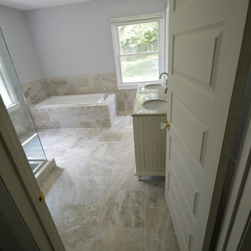 2 bathrooms become 1 Grand master bath with walk in closet