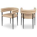 Meridian Furniture - Lavina Upholstered Dining Chair, Tan, Vegan Leather, Set of 2 - Experience the sophisticated allure of the Lavina tan vegan leather dining chair. This chair features a matte black finish and an iron metal frame, ensuring both durability and a modern edge. The contemporary design and luxurious vegan leather elevate your dining space with effortless elegance, making it the perfect centerpiece for gatherings. Enhance your dining area where classic elegance meets contemporary flair.