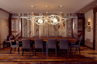 Inspiration for a mid-sized cottage dark wood floor enclosed dining room remodel in Other with beige walls and no fireplace