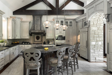 Open concept kitchen - large contemporary u-shaped porcelain tile open concept kitchen idea in Kansas City with an undermount sink, raised-panel cabinets, gray cabinets, granite countertops, gray backsplash, stainless steel appliances, an island and subway tile backsplash