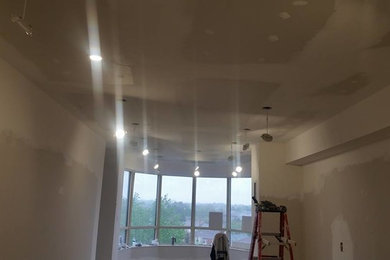 Pot lights installation in Condo with raised ceiling