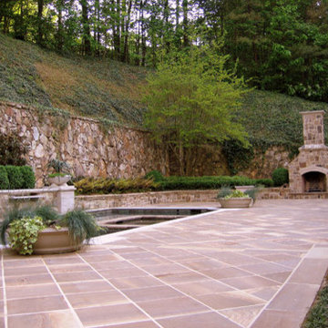 Fieldstone Fireplace and Massive retaining walls with Burlstone terrace