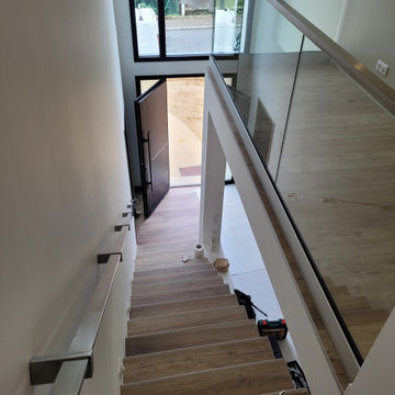 Garde-corps tout verre et main courante inox