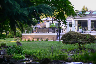 Example of a farmhouse deck design in New York