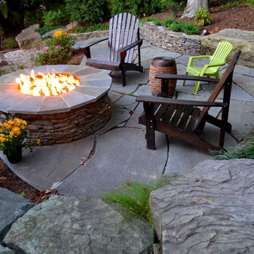 Alexandria Sloped Yard - Raised Patio, Fire Pit, & Water Feature