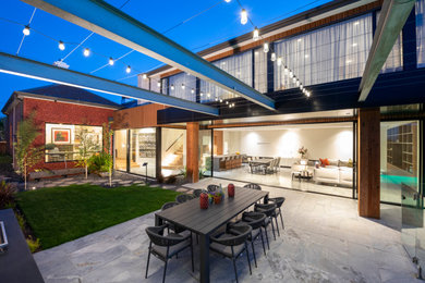 Inspiration for an expansive contemporary patio in Melbourne.
