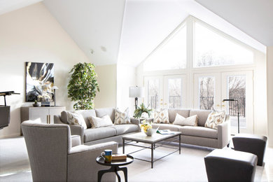 Living room - transitional vaulted ceiling living room idea in Calgary with beige walls