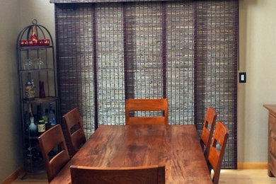 Example of a trendy dining room design in Denver