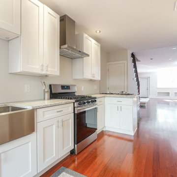 Looking from the backdoor through the kitchen