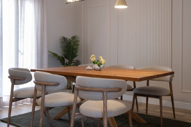 Imagen de comedor actual grande abierto con paredes beige