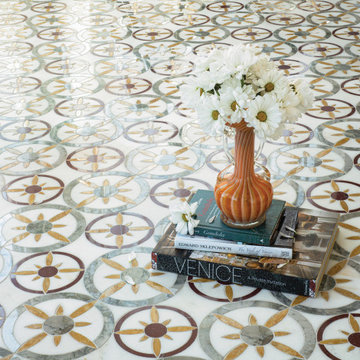 Margherita, a waterjet cut mosaic, shown in honed Orpheus Black, polished Blue M