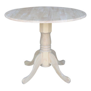 https://st.hzcdn.com/fimgs/3fe10bcc028e63ce_5155-w320-h320-b1-p10--traditional-dining-tables.jpg