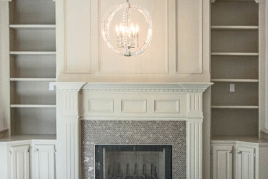 Example of a large classic study room design in Calgary with multicolored walls, a standard fireplace and a stone fireplace