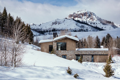 Rustic exterior home idea in Other