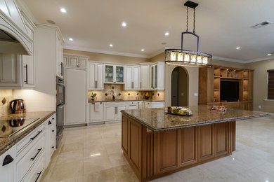 Example of a transitional kitchen design in Miami