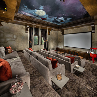 Diseño de cine en casa cerrado, mediterráneo, extra grande, con moqueta, pantalla de proyección, paredes grises y suelo gris