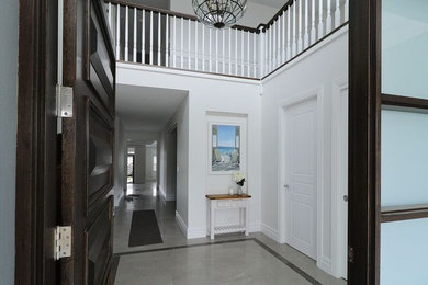 Design ideas for a large traditional foyer in Sydney with a single front door and a dark wood front door.