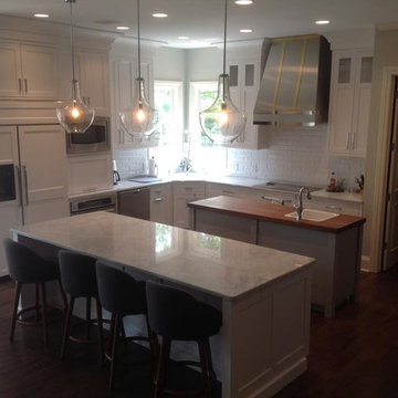 White kitchen, walnut top