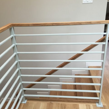 Modern steel railing with wood