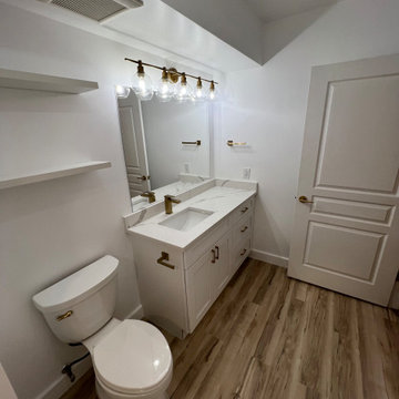 Bathroom Remodeling in Washington DC, with white cabinet and quartz countertop