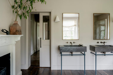 Photo of a classic bathroom in Wiltshire with grey walls, dark hardwood flooring, a console sink, brown floors and double sinks.