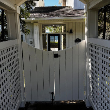 Classic White Garden Gate with Gabled Peaked Roof