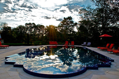Example of a huge tuscan pool design in New York