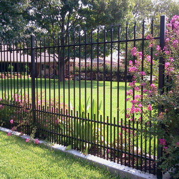 Ornamental iron fence with puppy bars