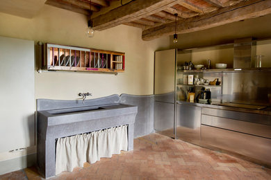Country kitchen photo in Other