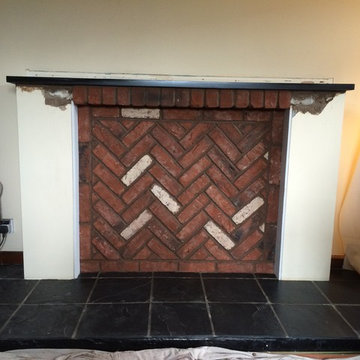 Esse 100 with log store, twin wall flue and alter fire place.By Embers & Ash