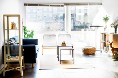Living room - mid-sized scandinavian ceramic tile living room idea in Other with blue walls