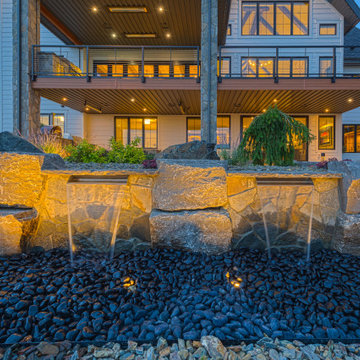 Luxury Backyard Retreat with Armour Stone & Water Feature | Genesis on the Lakes