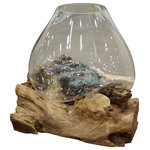 Harp and Finial - Bali Natural Glass Bowl Natural Root & Glass - A transitional decoration for any space, the Bali Natural Glass Bowl brings the beauty of the outdoors inside with wood and glass elements. This mixed-materials decoration features a handblown glass bowl on a raw teakwood base. Exquisite craftsmanship ensures no two pieces are exactly alike, so this decorative bowl is sure to stand out in any foyer, hallway, living room, kitchen, or bedroom.